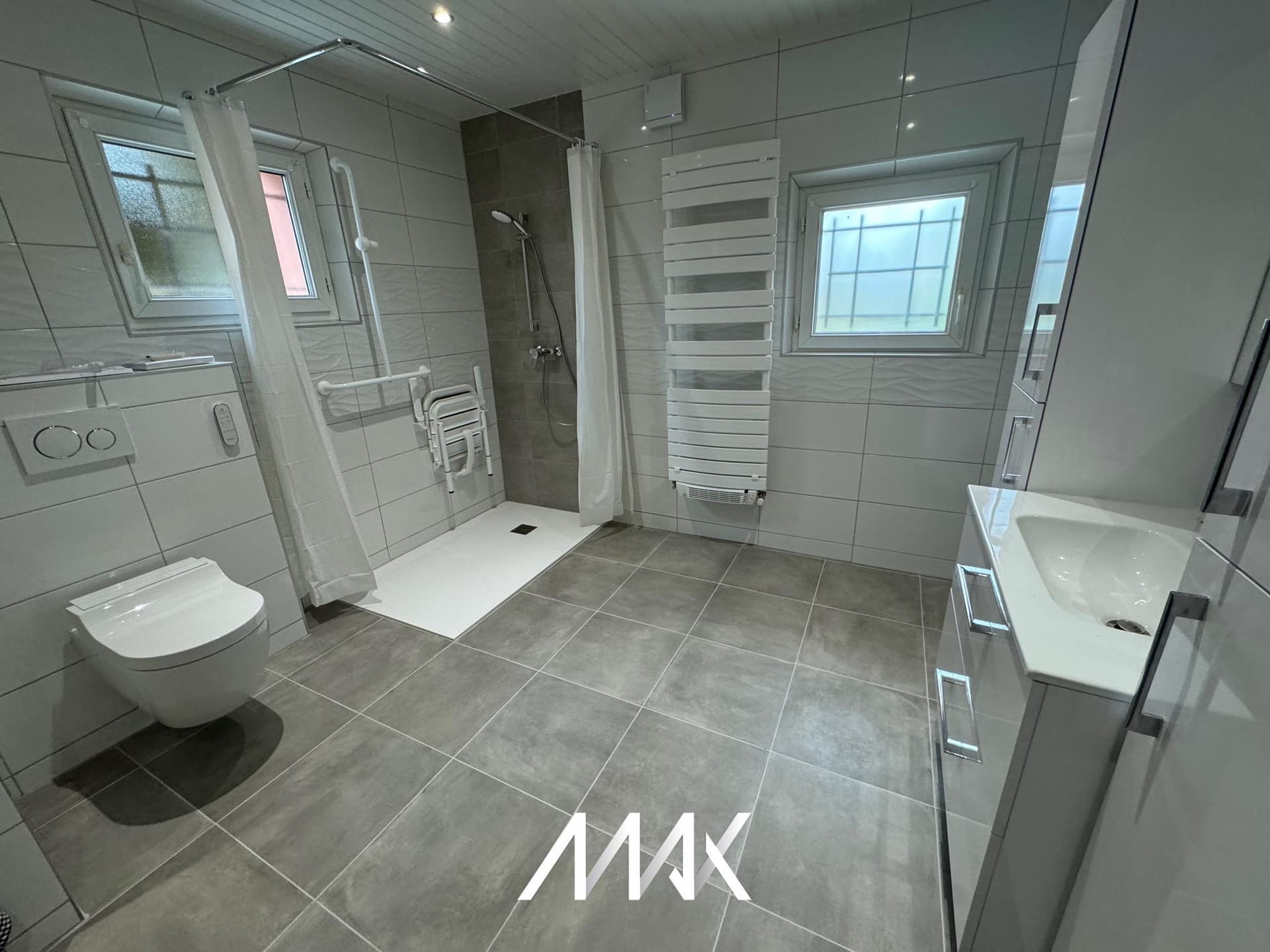 Rénovation de salle de bain réalisée par SASU Max